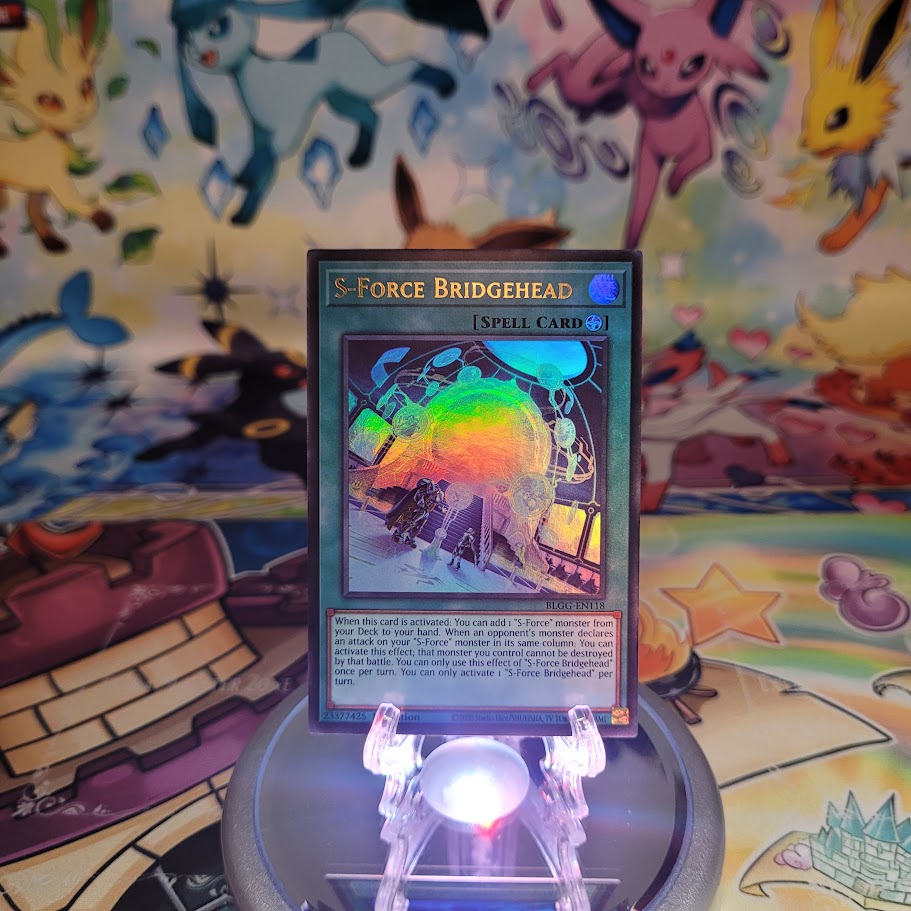 An Ultra Rare "S-Force Bridgehead" card from the Yugioh Set: Battles of Legend: Glorious Gallery (BLGG).