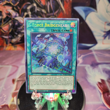 A Secret Rare "S-Force Bridgehead" card from the Yugioh Set: Blazing Vortex (BLVO).