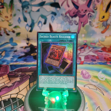 A Super Rare “Sacred Beasts Released” card from the Yugioh Set: Chaos Origins (CORI).