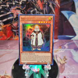 An Ultra Rare "Sage of Wisdom - Himmel" card from the Yugioh Set: Battles of Legend: Monstrous Revenge.