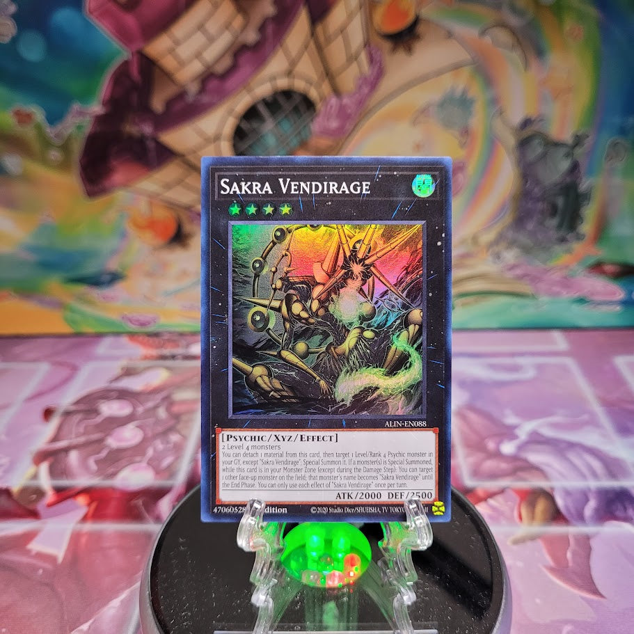 A Super Rare "Sakra Vendirage" card from the Yugioh Set: Alliance Insight (ALIN).