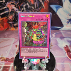 A Secret Rare "Sales Pitch" card from the Yugioh Set: Ignition Assault (IGAS).