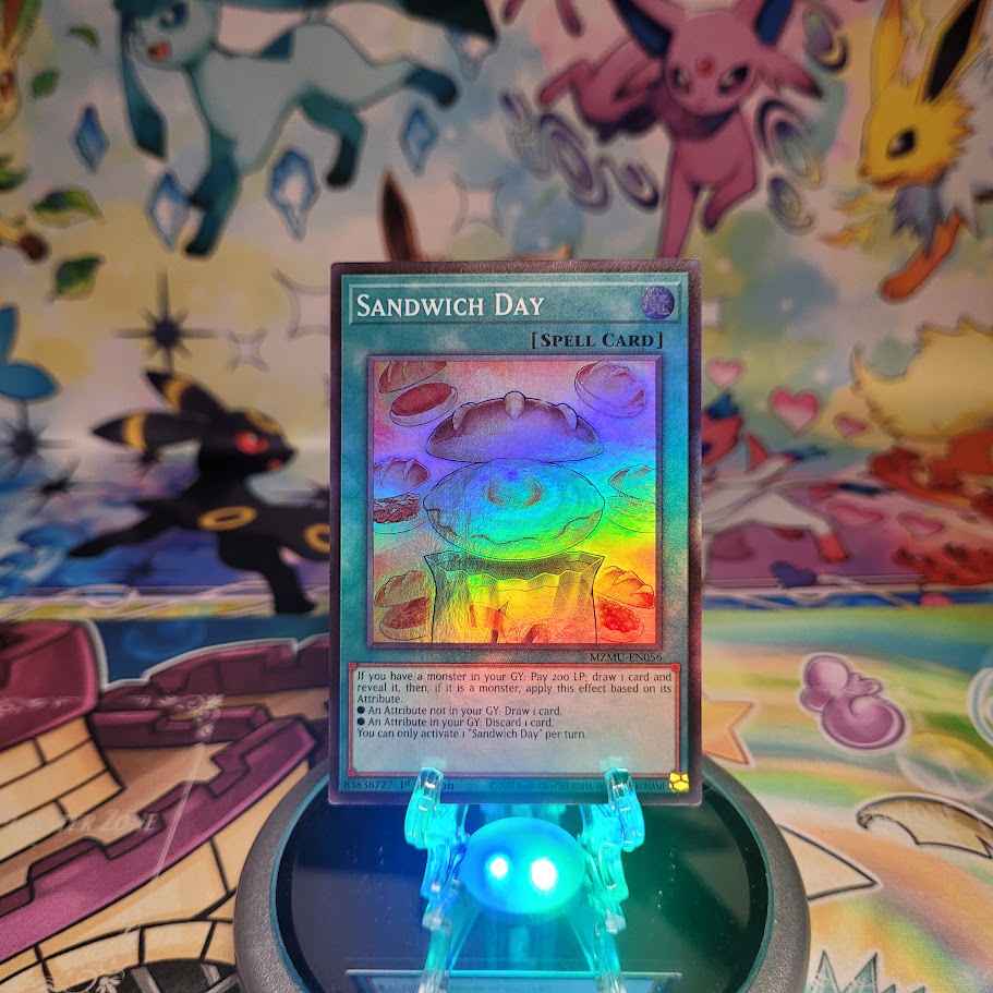 A Super Rare "Sandwich Day" card from the Yugioh Set: Maze of Muertos (MZMU).