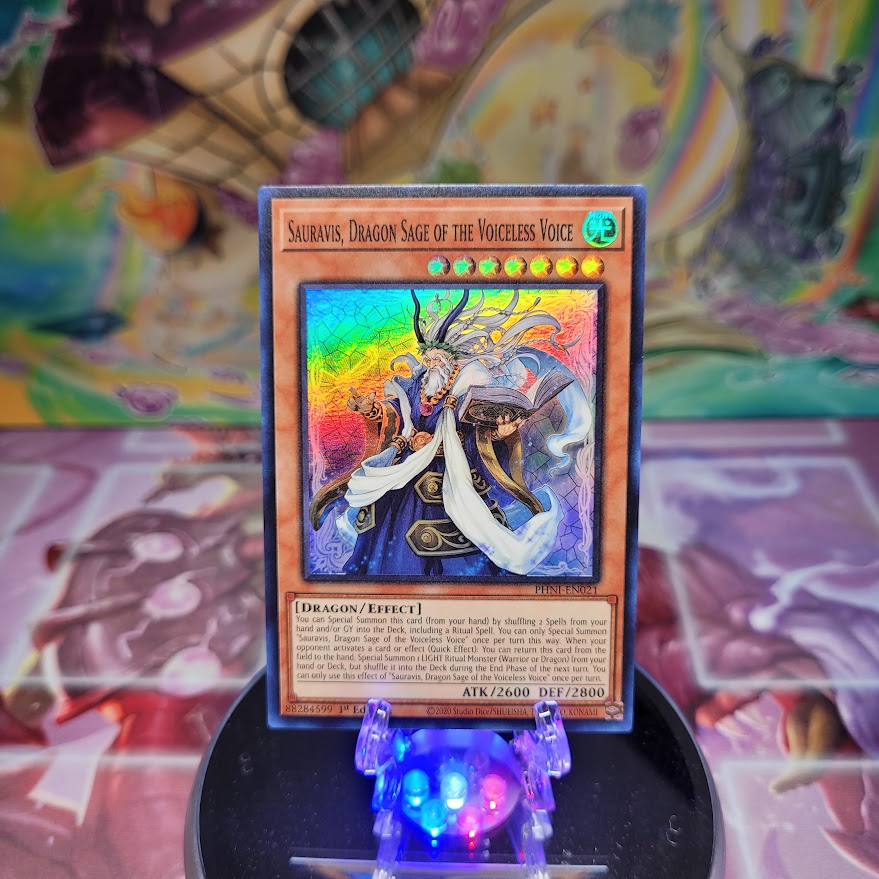 A Super Rare "Sauravis, Dragon Sage of the Voiceless Voice" card from the Yugioh Set: Phantom Nightmare.