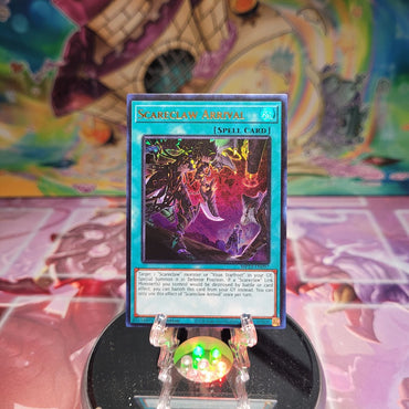 An Ultra Rare "Scareclaw Arrival" card from the Yugioh Dueling Heroes Mega-Tin Mega Pack.