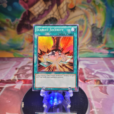 A Super Rare "Scarlet Security" card from the Yugioh Set: Legendary Collection 5D's.