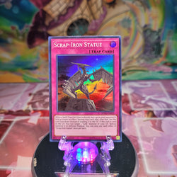 A Super Rare "Scrap-Iron Statue" card from the Yugioh Set: Spirit Warriors (SPWA).