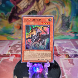 A Super Rare "Scrap Chimera" card from the Yugioh Set: Duelist Revolution.