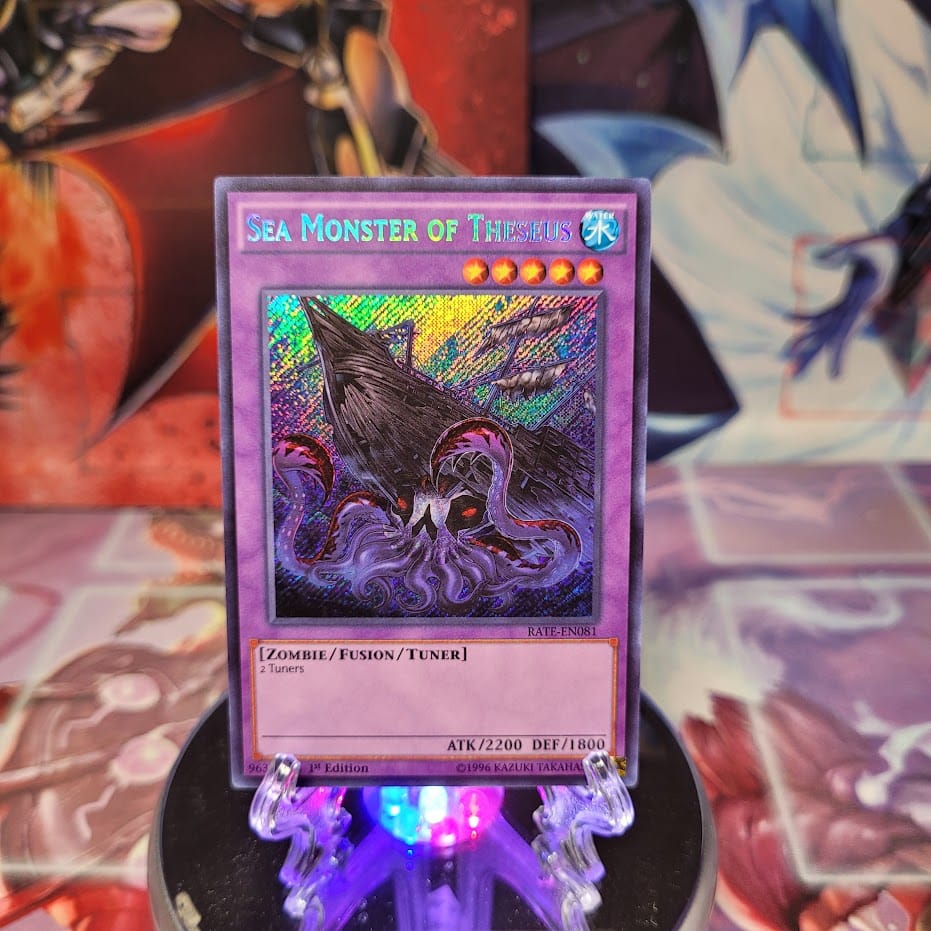 A Secret Rare "Sea Monster of Theseus" card from the Yugioh Set: Raging Tempest (RATE).