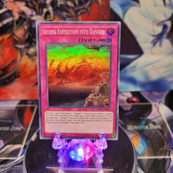 A Super Rare "Second Expedition Into Danger!" card from the Yugioh Set: Soul Fusion.