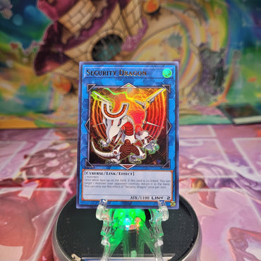 An Ultra Rare "Security Dragon" card from the Yugioh Set: Battles of Legend: Chapter 1.