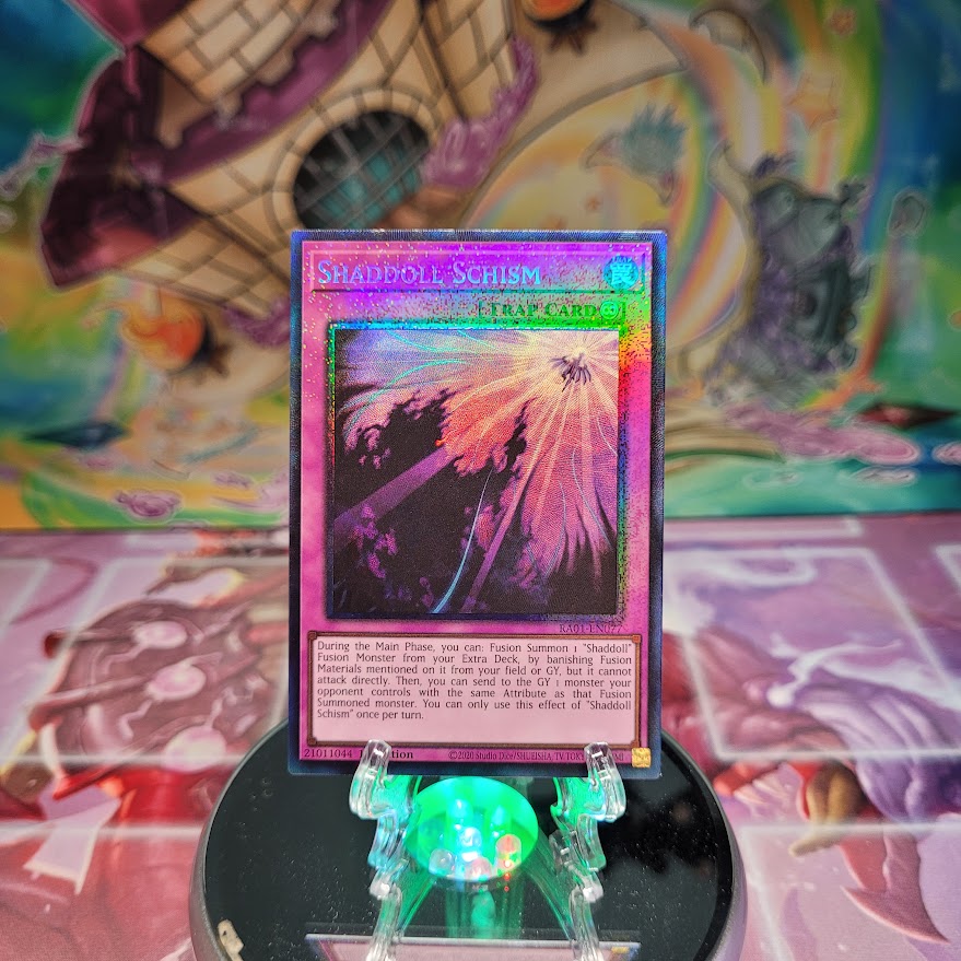 A Prismatic Collector's Rare "Shaddoll Schism" card from the Yugioh Set: Rarity Collection 1 (RA01).