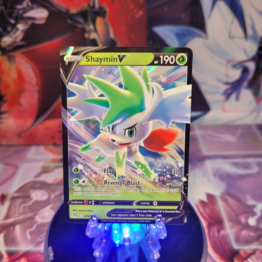 An Ultra Rare "Shaymin V" (013/172) card from the Pokemon Set: Brilliant Stars.