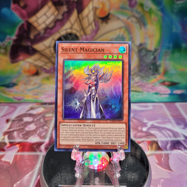 A Super Rare "Silent Magician" card from the Yugioh Set: Rarity Collection 2 (RA02).