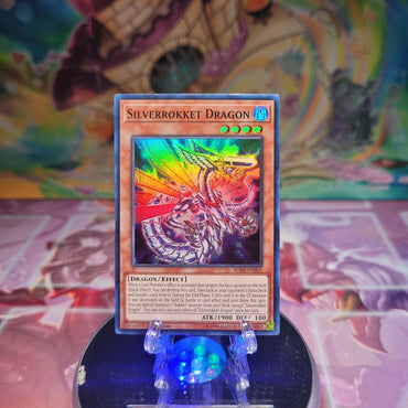 A Super Rare "Silverrokket Dragon" card from the Yugioh Structure Deck: Rokket Revolt.