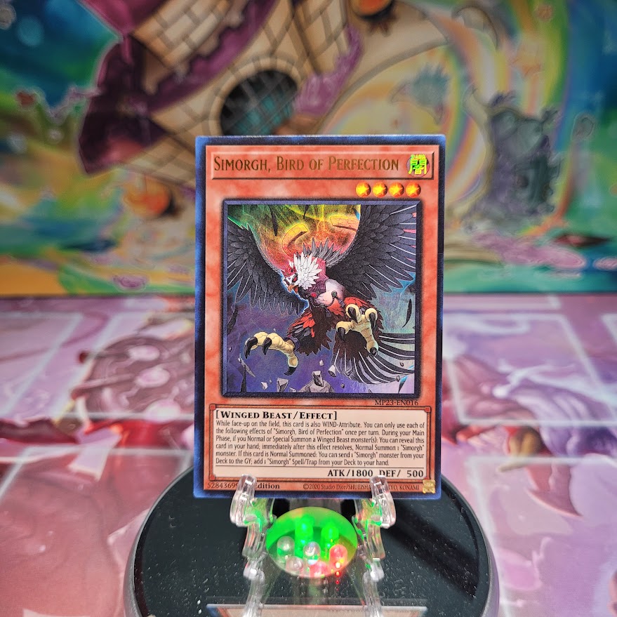 An Ultra Rare "Simorgh, Bird of Perfection" card from the Yugioh Dueling Heroes Mega-Tin Mega Pack.