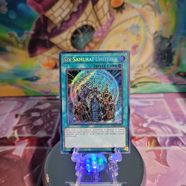 A Secret Rare "Six Samurai United" card from the Yugioh Set: Quarter Century Bonanza (RA03).