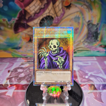 A Quarter Century Secret Rare "Skull Servant" card from the Yugioh Set: Quarter Century Stampede (RA04).