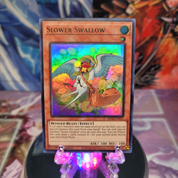 A Super Rare "Slower Swallow" card from the Yugioh 2022 Tin of the Pharaoh's Gods Set.