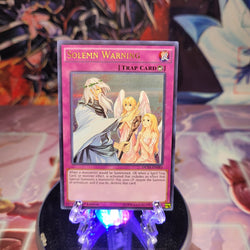 An Ultra Rare "Solemn Warning" card from the Yugioh Set: Duelist Saga (DUSA).
