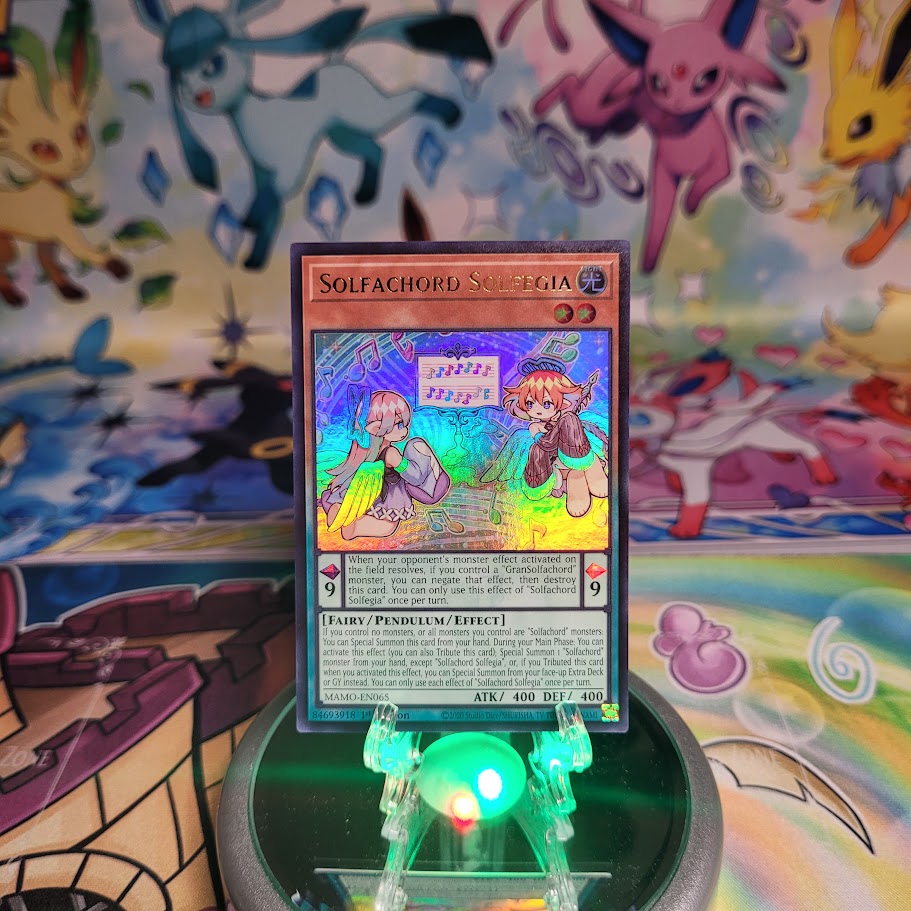 An Ultra Rare "Solfachord Solfegia" card from the Yugioh Set: Magnificent Monsters (MAMO).