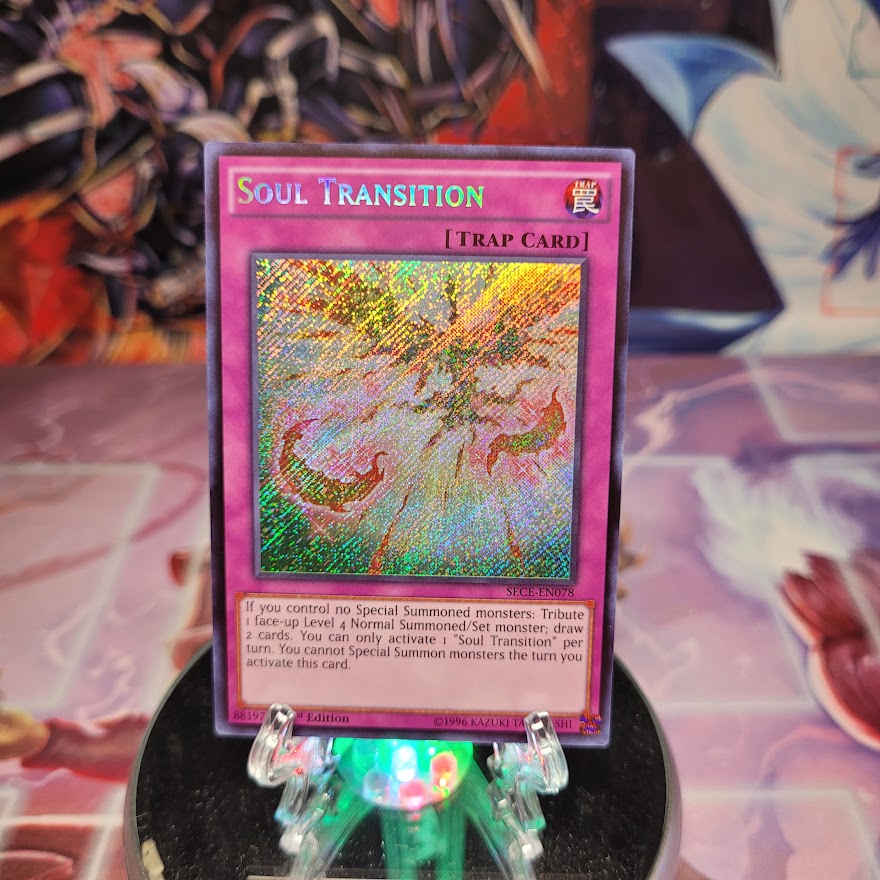 A Secret Rare "Soul Transition" card from the Yugioh Set: Secrets of Eternity (SECE).
