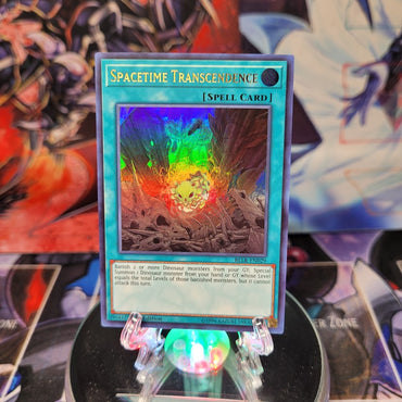 An Ultra Rare "Spacetime Transcendence" card from the Yugioh Set: Battles of Legend: Light's Revenge.