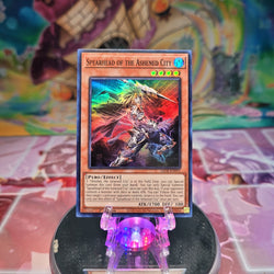 A Super Rare "Spearhead of the Ashened City" card from the Yugioh Set: Legacy of Destruction.