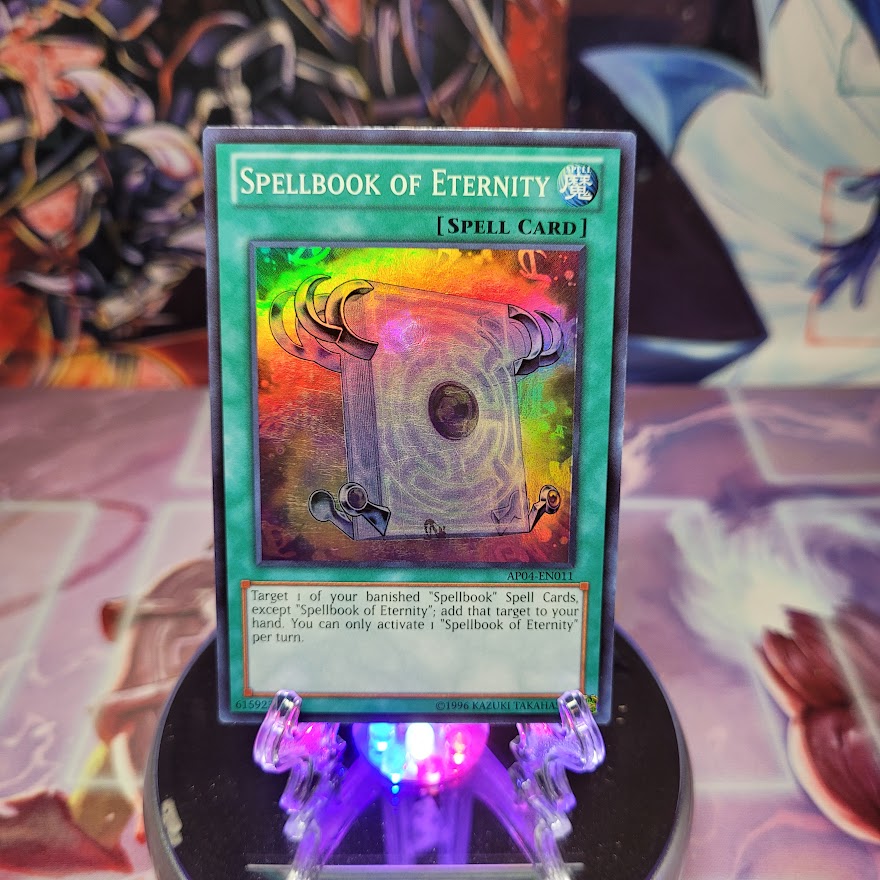 A Super Rare "Spellbook of Eternity" card from the Yugioh Set: Astral Pack 4 (AP04).