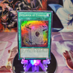 A Super Rare "Spellbook of Eternity" card from the Yugioh Set: Astral Pack 4 (AP04).