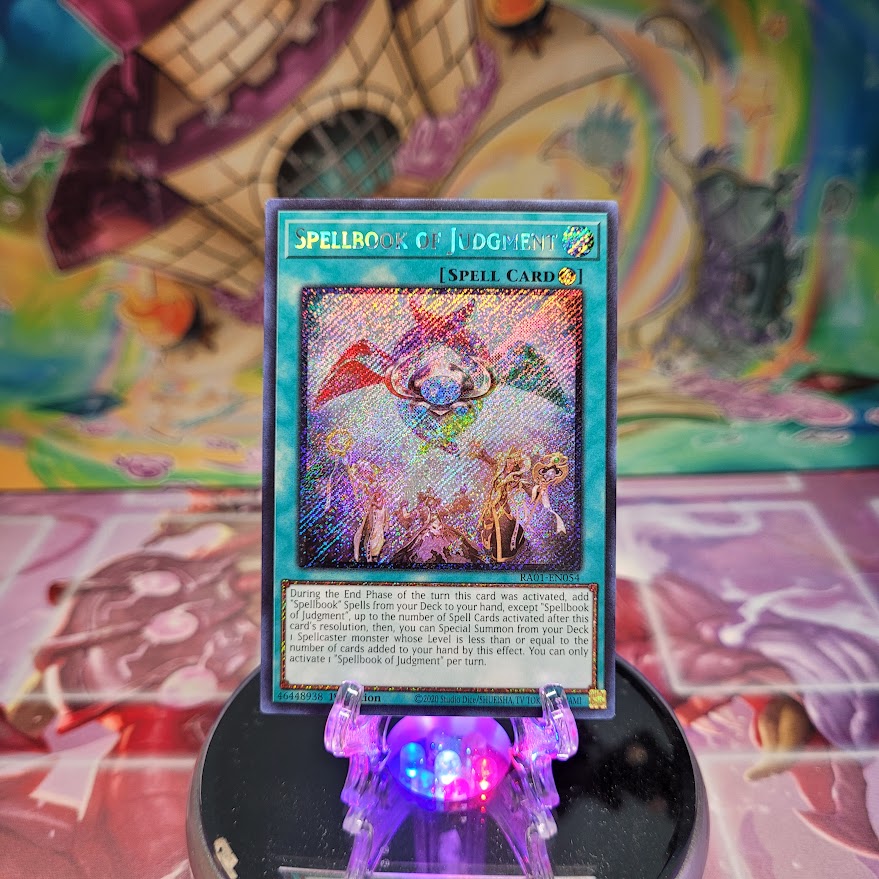 A Platinum Secret Rare "Spellbook of Judgment" card from the Yugioh Set: Rarity Collection 1 (RA01).