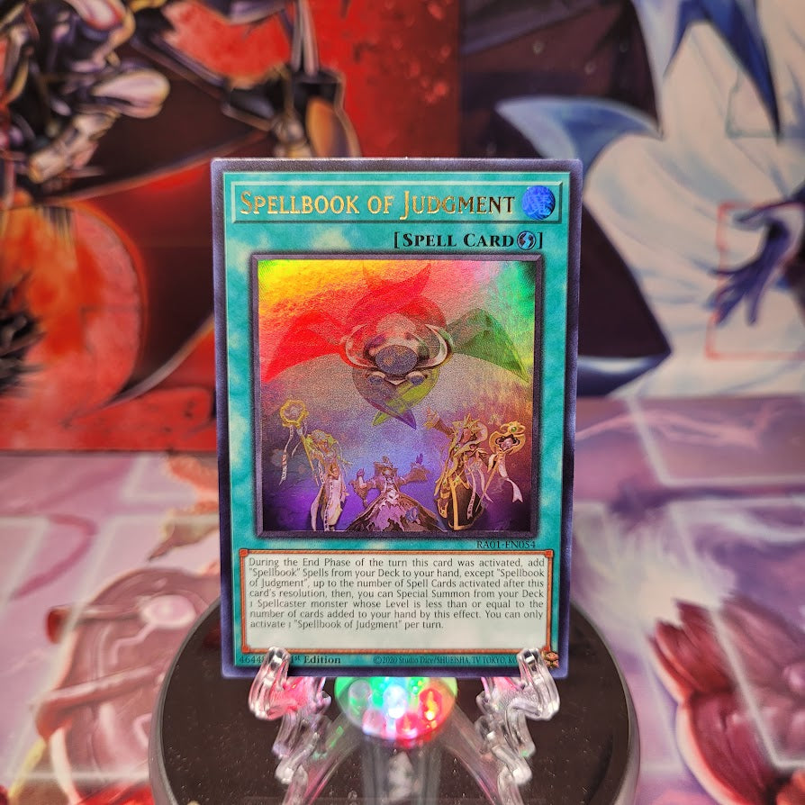 An Ultra Rare "Spellbook of Judgment" card from the Yugioh Set: Rarity Collection 1 (RA01).