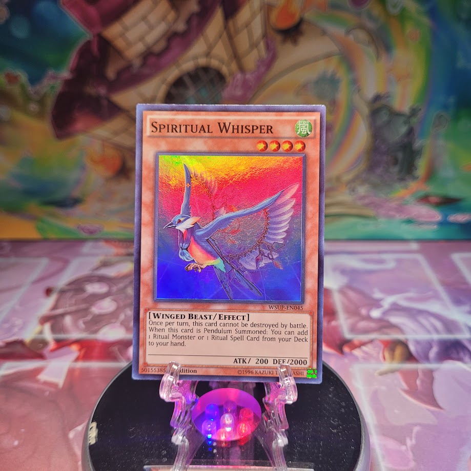 A Super Rare "Spiritual Whisper" card from the Yugioh Set: World Superstars.