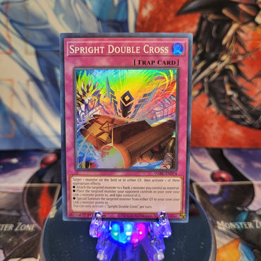 A Super Rare "Spright Double Cross" card from the Yugioh Set: Darkwing Blast.