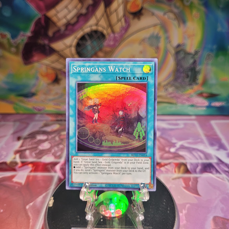 A Super Rare "Springans Watch" card from the Yugioh Set: Blazing Vortex.