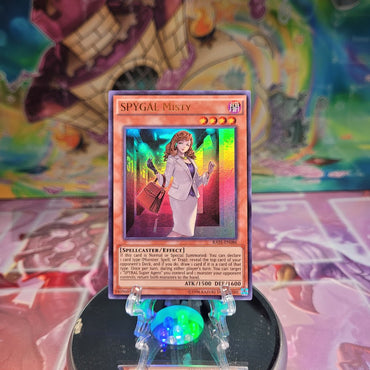 An Ultra Rare "Spygal Misty" card from the Yugioh Set: Raging Tempest.