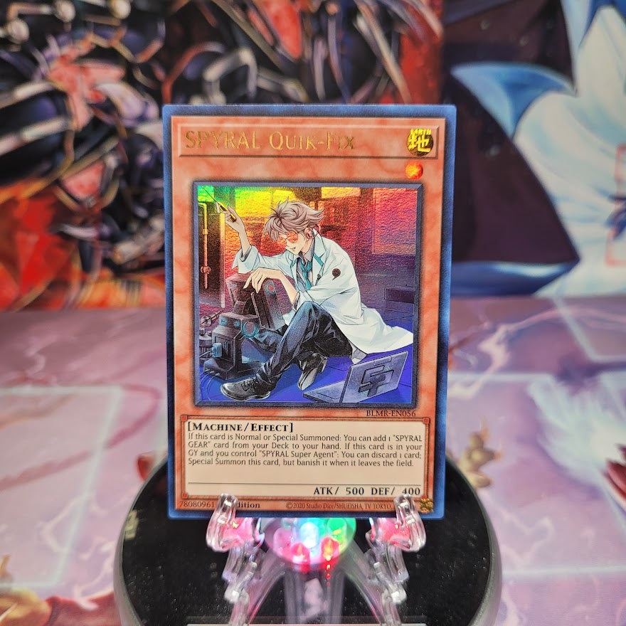 An Ultra Rare "Spyral Quik-Fix" card from the Yugioh Set: Battles of Legend: Monstrous Revenge.