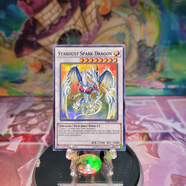 A Super Rare "Stardust Spark Dragon" card from the Yugioh Set: High-Speed Riders.