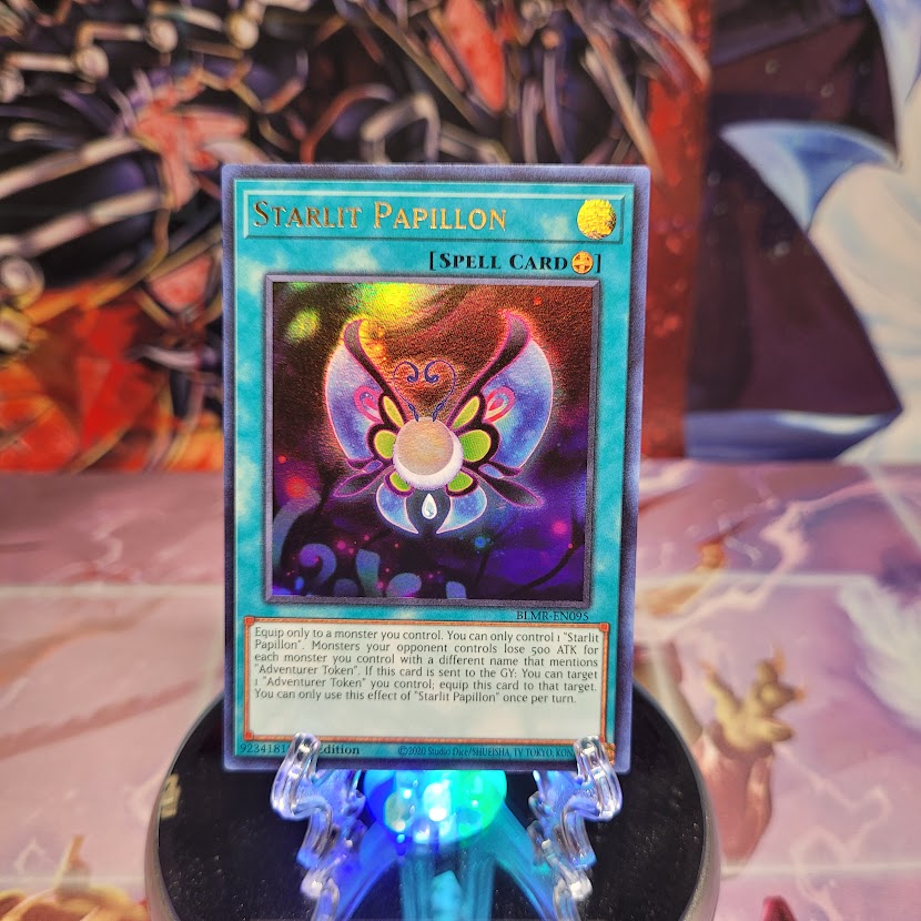 An Ultra Rare "Starlit Papillon" card from the Yugioh Set: Battles of Legend: Monstrous Revenge.