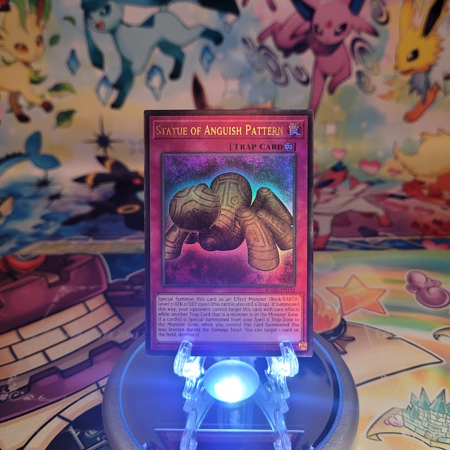An Ultra Rare "Statue of Anguish Pattern" card from the Yugioh Set: Battles of Legend: Glorious Gallery (BLGG).