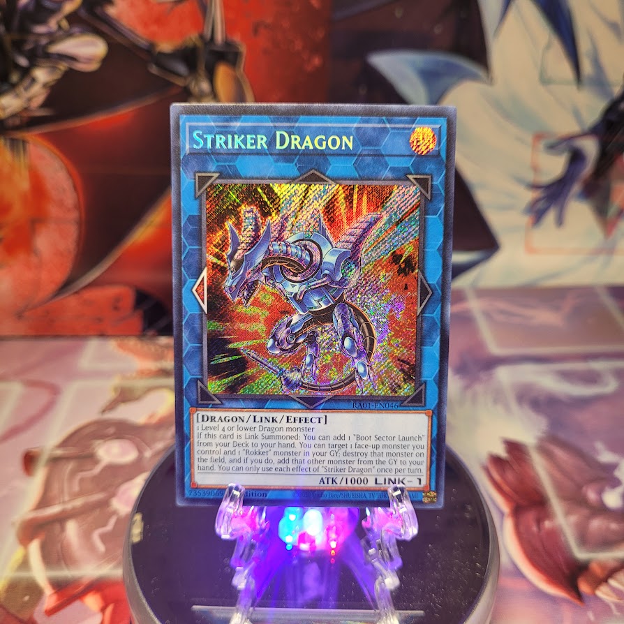 A Secret Rare "Striker Dragon" card from the Yugioh Set: Rarity Collection 1 (RA01).