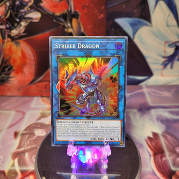 A Super Rare "Striker Dragon" card from the Yugioh Set: Rarity Collection 1 (RA01).