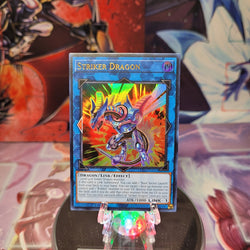 An Ultra Rare "Striker Dragon" card from the Yugioh Set: Rarity Collection 1 (RA01).