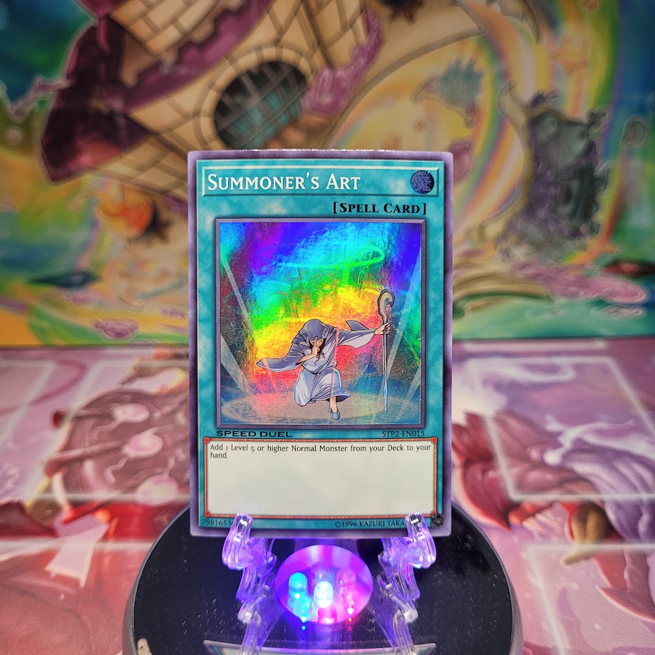 A Super Rare "Summoner's Art" card from the Yugioh Set: Speed Duel Tournament Pack 2.