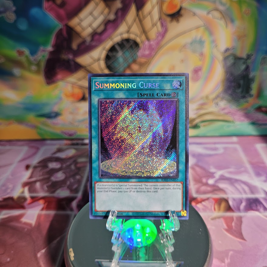 A Secret Rare "Summoning Curse" card from the Yugioh Set: Quarter Century Bonanza (RA03).