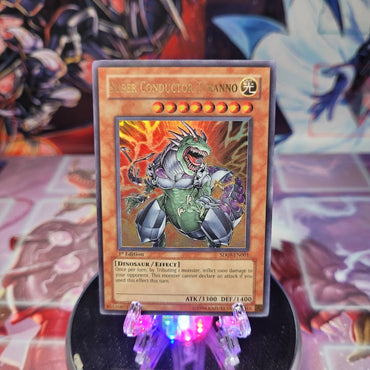 An Ultra Rare "Super Conductor Tyranno" card from the Yugioh Structure Deck: Dinosaur's Rage.