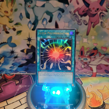An Ultra Rare "Super Polymerization" card from the Yugioh Structure Deck: The Fallen & The Virtuous (CH01).