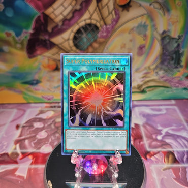 An Ultra Rare "Super Polymerization" card from the Yugioh Set: Quarter Century Bonanza (RA03).