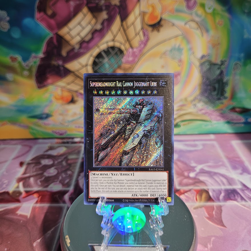  A Secret Rare "Superdreadnought Rail Cannon Juggernaut Liebe" card from the Yugioh Set: Quarter Century Bonanza (RA03).