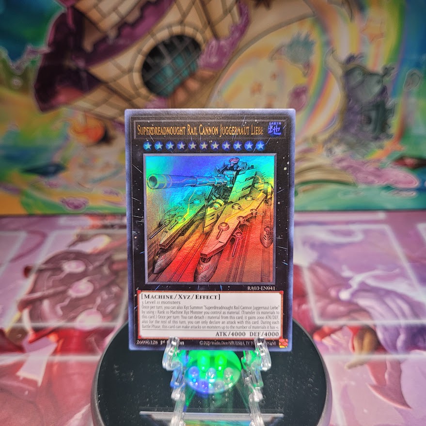 An Ultra Rare "Superdreadnought Rail Cannon Juggernaut Liebe" card from the Yugioh Set: Quarter Century Bonanza (RA03).